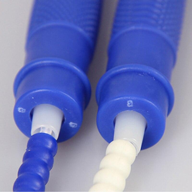 Children And Adults Skipping Rope