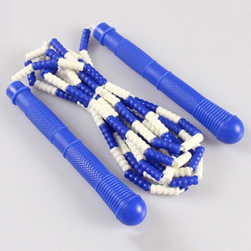 Children And Adults Skipping Rope
