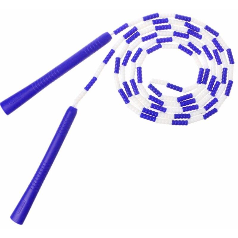 Children And Adults Skipping Rope